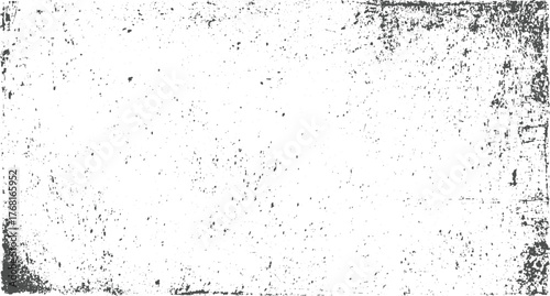 Grungy distressed texture with dark speckles and scratches grunge background