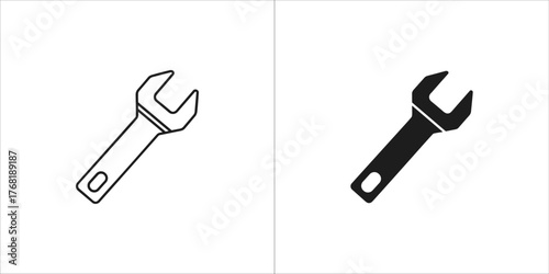 Two wrench icons, one outlined and one solid black