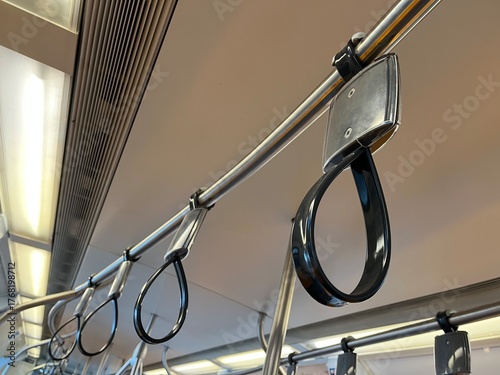 Hanging straps are safety for standing passengers on public transport.