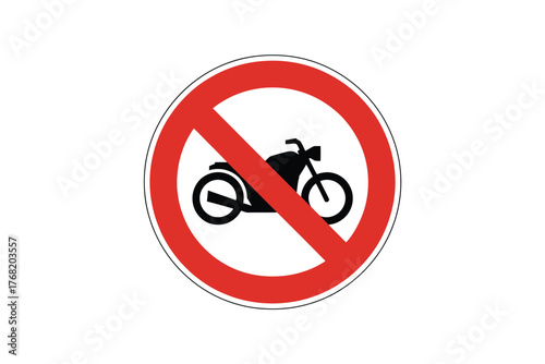 A circular red and white sign with a black motorcycle and a red diagonal line