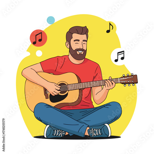 Bearded man playing acoustic guitar while sitting crosslegged in a relaxed pose against a yellow backdrop, enjoying the music and expressing creativity.