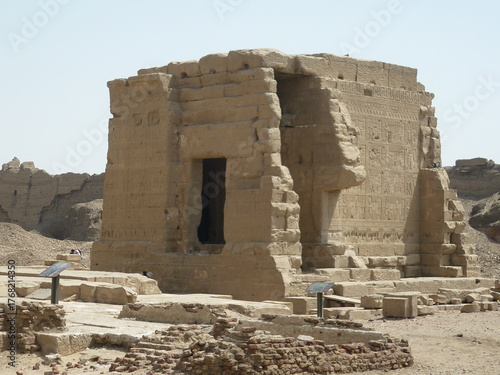 April, Egypt 2010: Ancient Egyptian temple ruins in the desert sun.