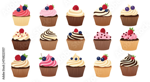 A variety of colorful and delicious cupcakes topped with berries and swirls of frosting.