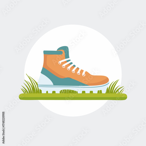 Stylish Orange and Teal High-Top Sneaker on Green Grass.