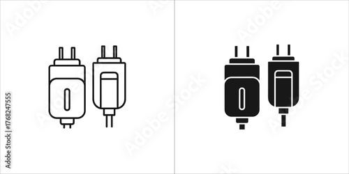 Two electrical power adapters in outline and solid black silhouette