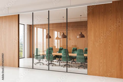 Fotografía Modern conference room interior with green chairs, wooden walls, and glass partitions in a sleek office environment