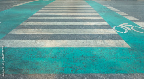 Fotografía Pedestrian crosswalk in urban street, people walking safely across the road
