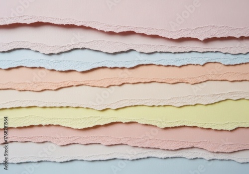 Soft pastel paper layers with torn edges abstract background texture