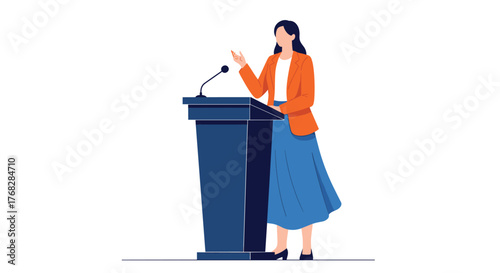 A confident woman in a blazer and skirt stands behind a podium with a microphone, gesturing during a public speech or presentation.