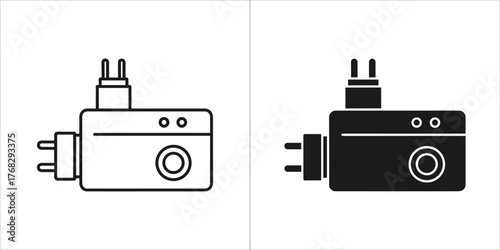 Two universal travel adapter plugs, one outline and one solid black