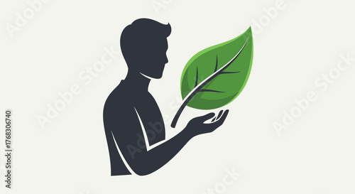 Silhouette of a Man Holding a Leaf Symbolizing Environmental Consciousness and Sustainability Effort