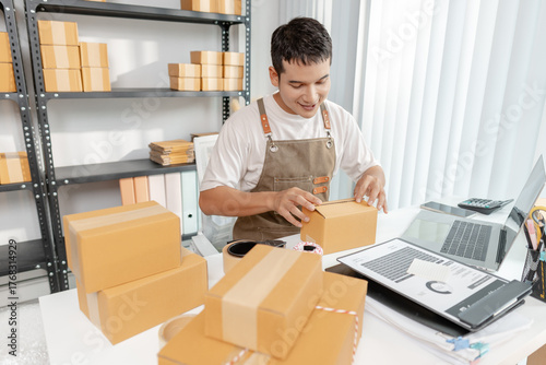 Ecommerce concept with startup entrepreneur handling goods, showing online store operations, digital retail solutions, and the role of innovation in global small business development.