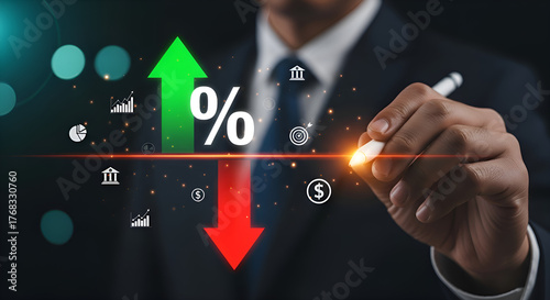 Business professional analyzing financial growth charts and percentage symbols with a digital penStock photo for website - Business and technology concept photo