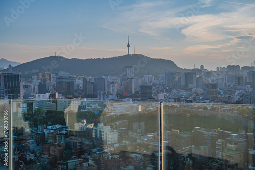 Photography Seoul's Namsan Tower and its surrounding cityscape during the autumn day
