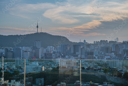 Photography Seoul's Namsan Tower and its surrounding cityscape during the autumn day