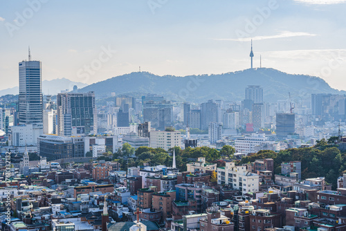 Photography Seoul's Namsan Tower and its surrounding cityscape during the autumn day