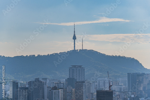 Photography Seoul's Namsan Tower and its surrounding cityscape during the autumn day