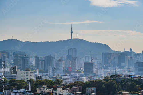 Photography Seoul's Namsan Tower and its surrounding cityscape during the autumn day