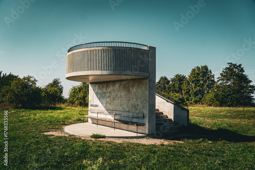 Photography Modern concrete observation tower by the water