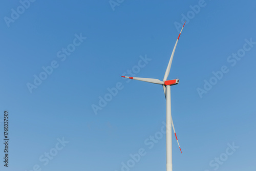 Wind Turbine Under Blue Sky