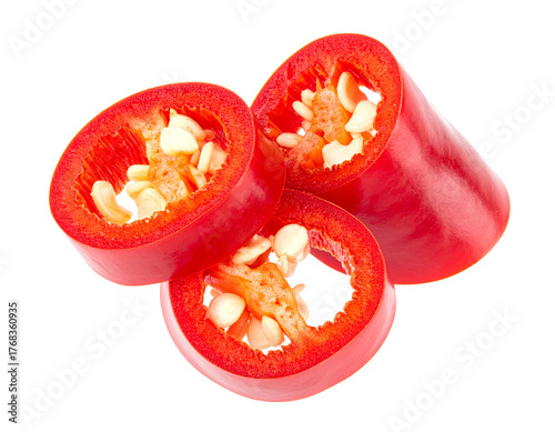 Multiple slices of red chili pepper rings isolated on white