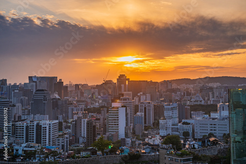 Photography Seoul's Namsan Tower and its surrounding cityscape during the autumn day