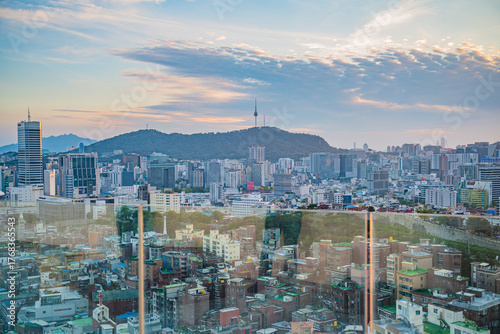 Photography Seoul's Namsan Tower and its surrounding cityscape during the autumn day