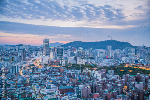 Photography Seoul's Namsan Tower and its surrounding cityscape during the autumn day