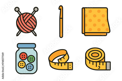 Colorful knitting yarn, crochet hook, buttons, fabric, and measuring tapes for crafting projects