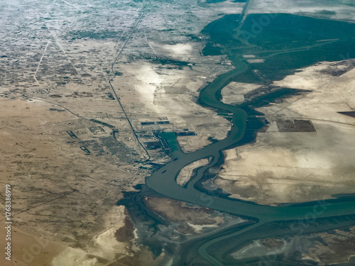 фотографія aerial landscape view of area around Umm Qasr, a port city located at Khawr Abd
