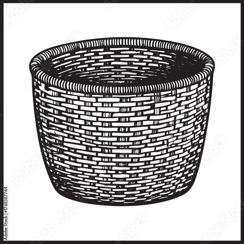 An empty, round wicker basket with tight weave.