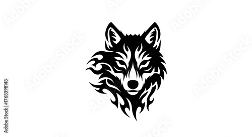 A striking black and white tribal wolf head design with flame-like accents on its fur.