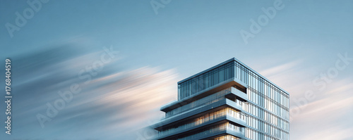 Sleek skyscraper against a blurred sky, symbolizing ambition, progress and modernity. Ideal for corporate communications, real estate or architectural projects.