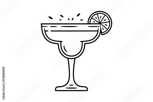 A lime margarita in a coupe glass with a lime wedge garnish.