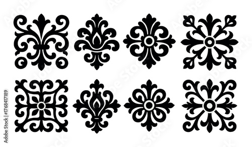 Elegant black floral patterns with symmetrical design elements on olive background