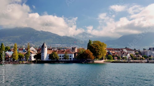 Real Time of 4K Castle and City by Lake Geneva with Boats and Mountain. La Tour-de-Peilz , Vaud, Switzerland.