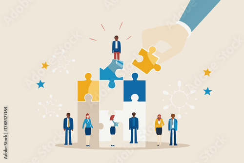 Teamwork and collaboration building success with puzzle pieces and diverse business people