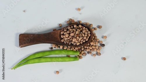cluster beans or gawar phali(guar) and seed on the white background,cyamopsis tetragonoloba