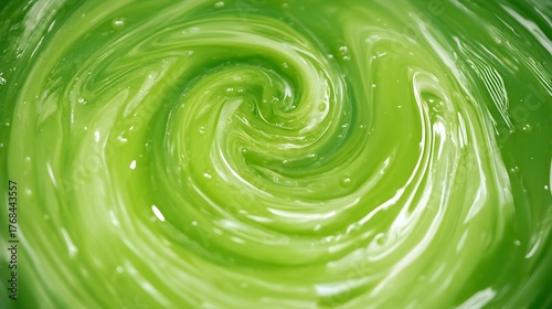 Abstract Swirling Green Liquid Texture Background image