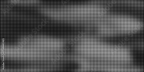 Abstract halftone faded gradient texture. Dotted smoke clouds retro style. White and black noise background.