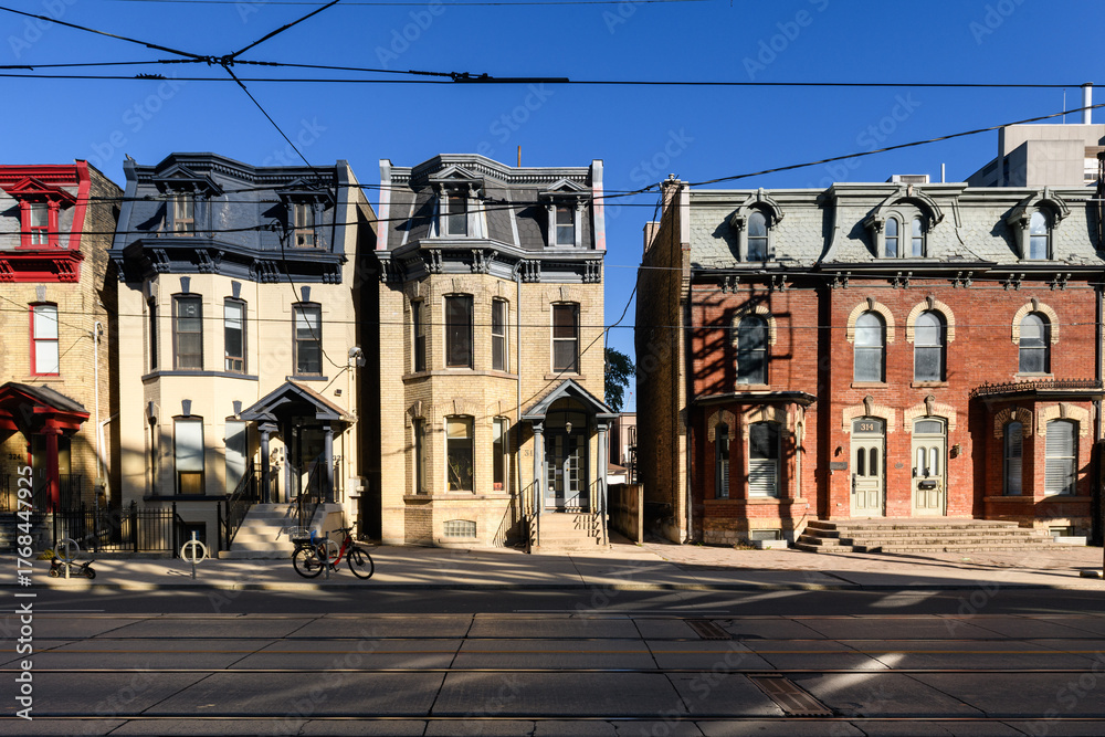 Fototapeta premium Historic, century-old homes in the downtown section of the city of Toronto, Ontario, Canada.