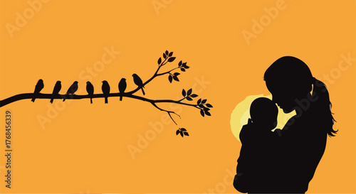 Silhouette of mother holding baby at sunset with birds