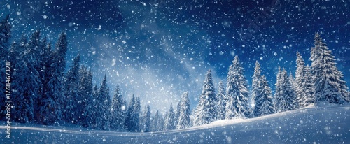 Snowing forest landscape under a starry, dark blue sky
