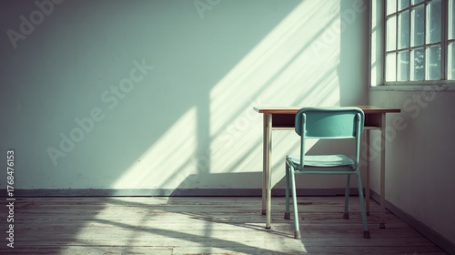 melancholy. Single desk in corner of empty classroom with soft natural light. wellbeing guides, coaching materials, designed for mental health education and mindfulness programs.