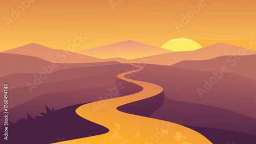 Winding desert road under a warm sunset sky