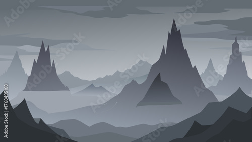 Mysterious and atmospheric landscape with sharp mountain peaks and fog
