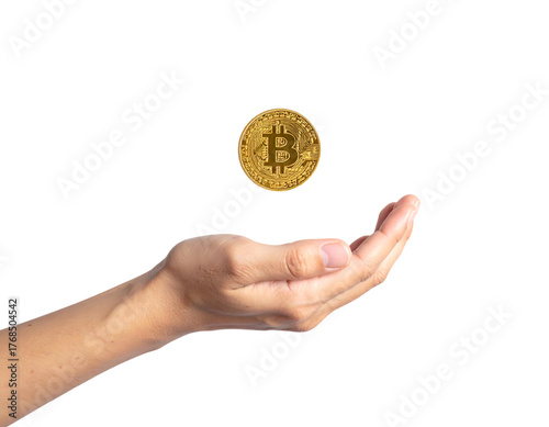 Gold Bitcoin Coin Levitating Above Open Hand on Black cryptocurrency digital currency