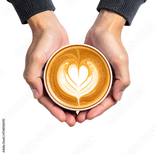 Hands holding a cup of latte coffee with a heart shape on black