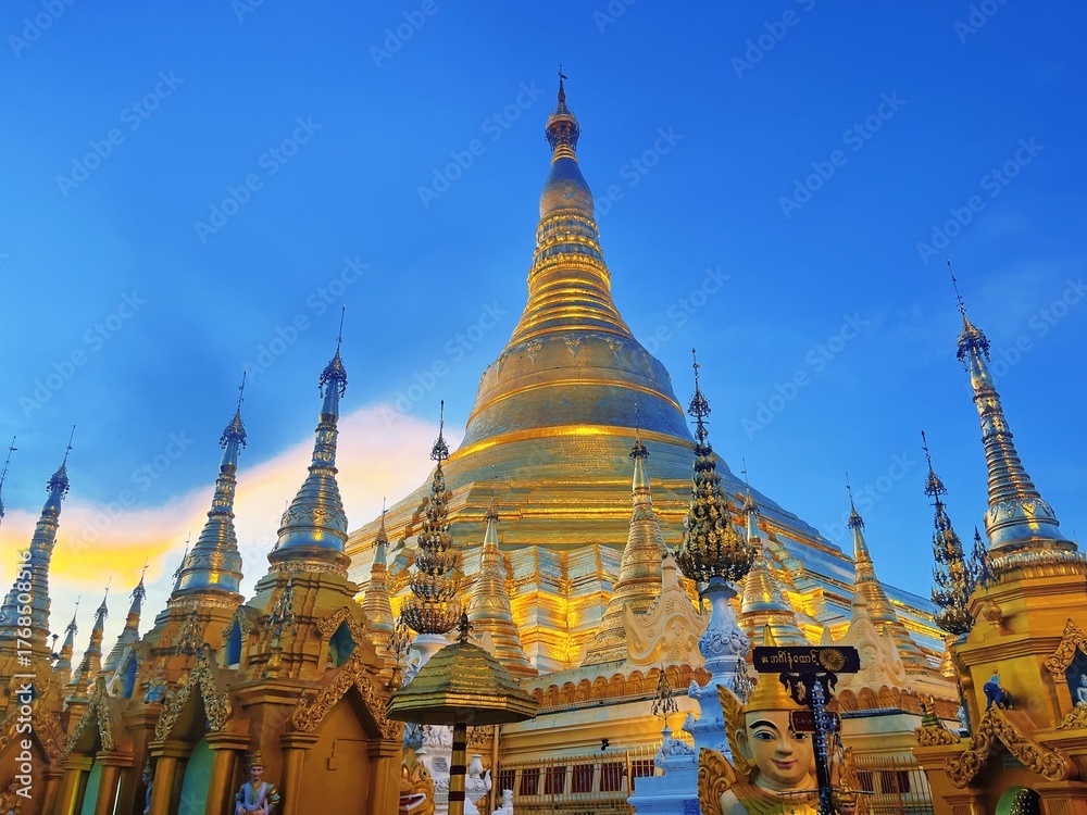 Fototapeta premium Shwedagon Pagoda in Yangon Myanmar, Famous Golden Buddhist Temple Landmark with Blue Sky