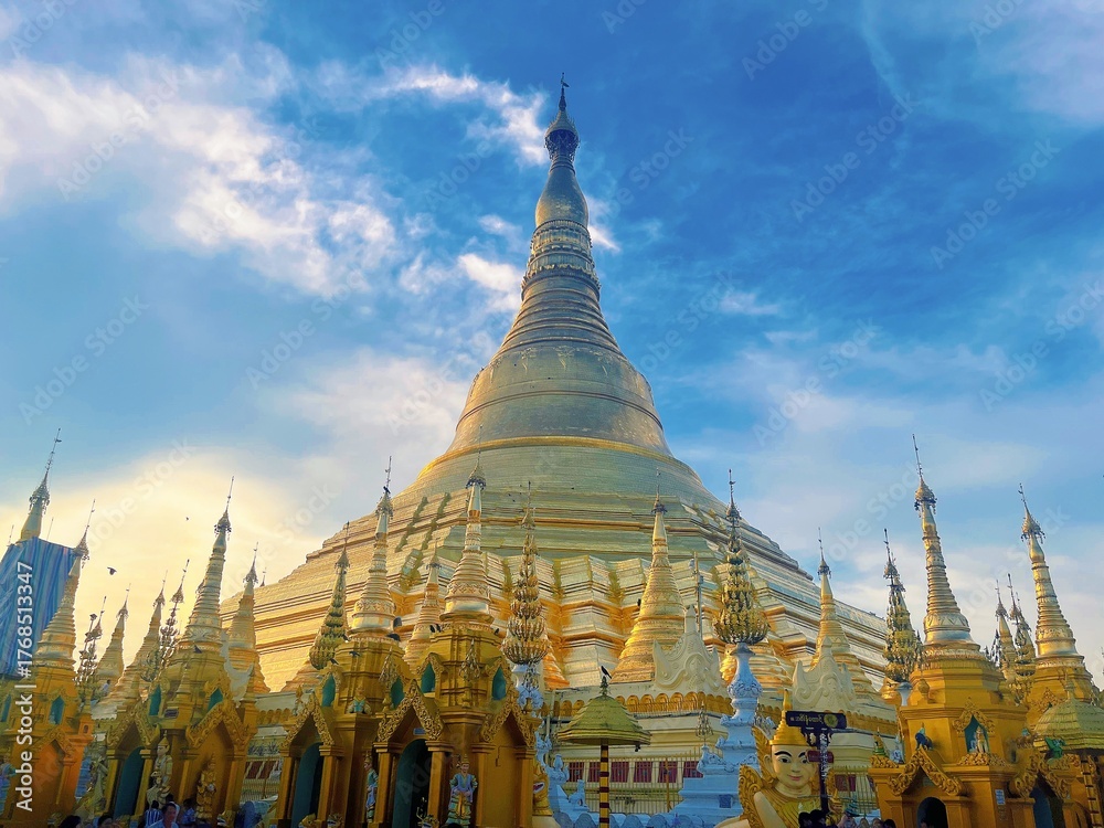 Fototapeta premium Shwedagon Pagoda in Yangon Myanmar, Famous Golden Buddhist Temple Landmark with Blue Sky